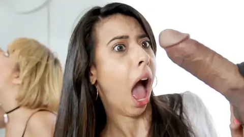 Brown-haired and a platinum-blonde are sharing stiffys in a fourway